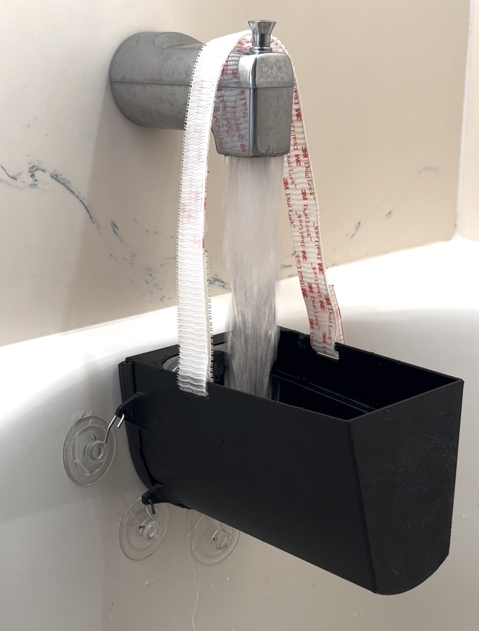 Bender Devices tub overflow tester in use during home inspection